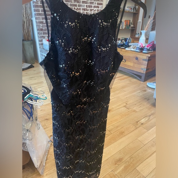 Black knee-length cocktail dress. Sequins & lacy embellishments, mesh cutouts - Picture 2 of 4